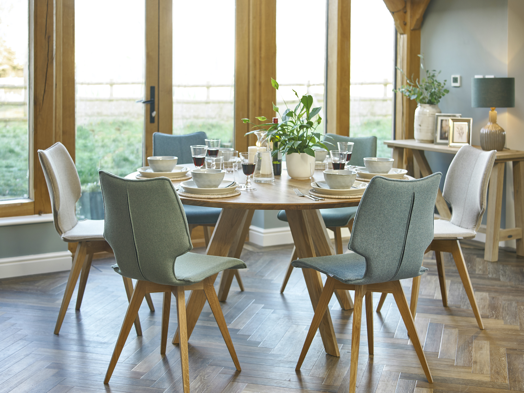 Tresco round dining table and Lulu chairs